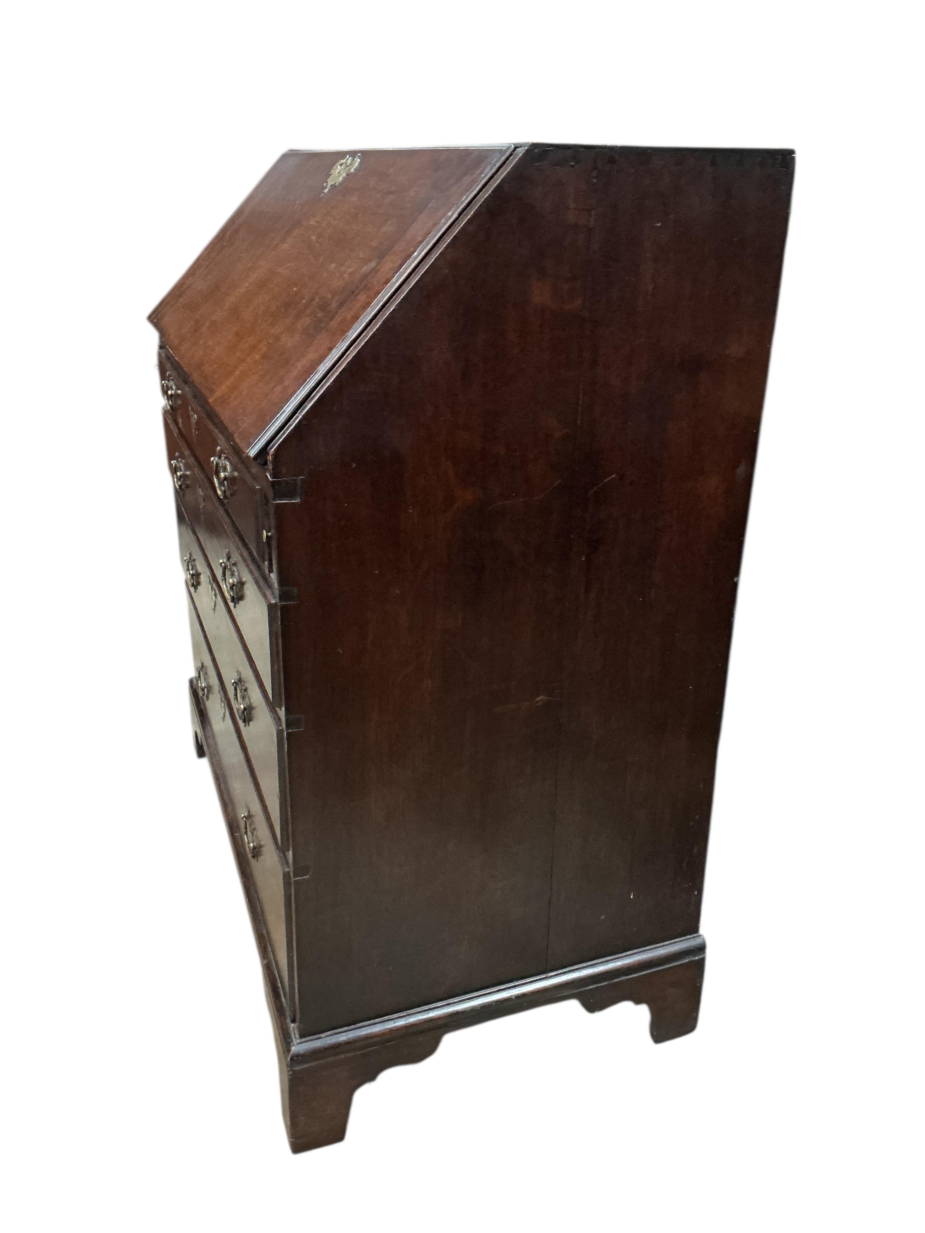 A George III oak bureau, width 91cm, depth 51cm, height 103cm